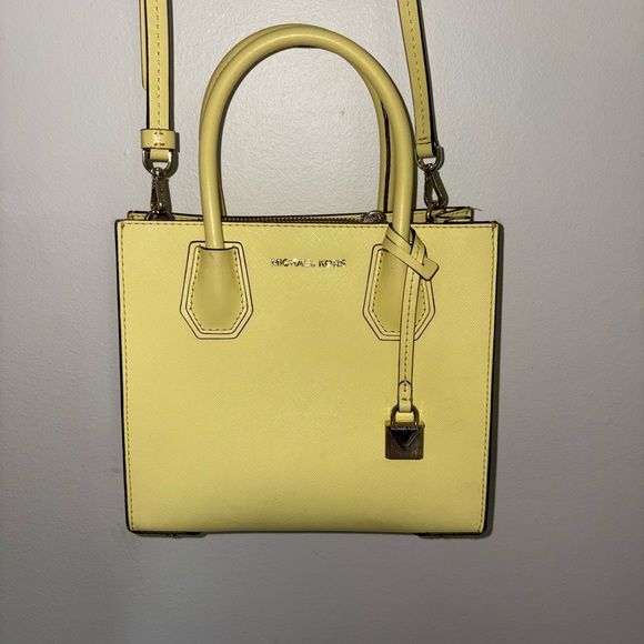 Michael Kors Handbags - Michael Kors Yellow Mini Bag with Padlock Charm